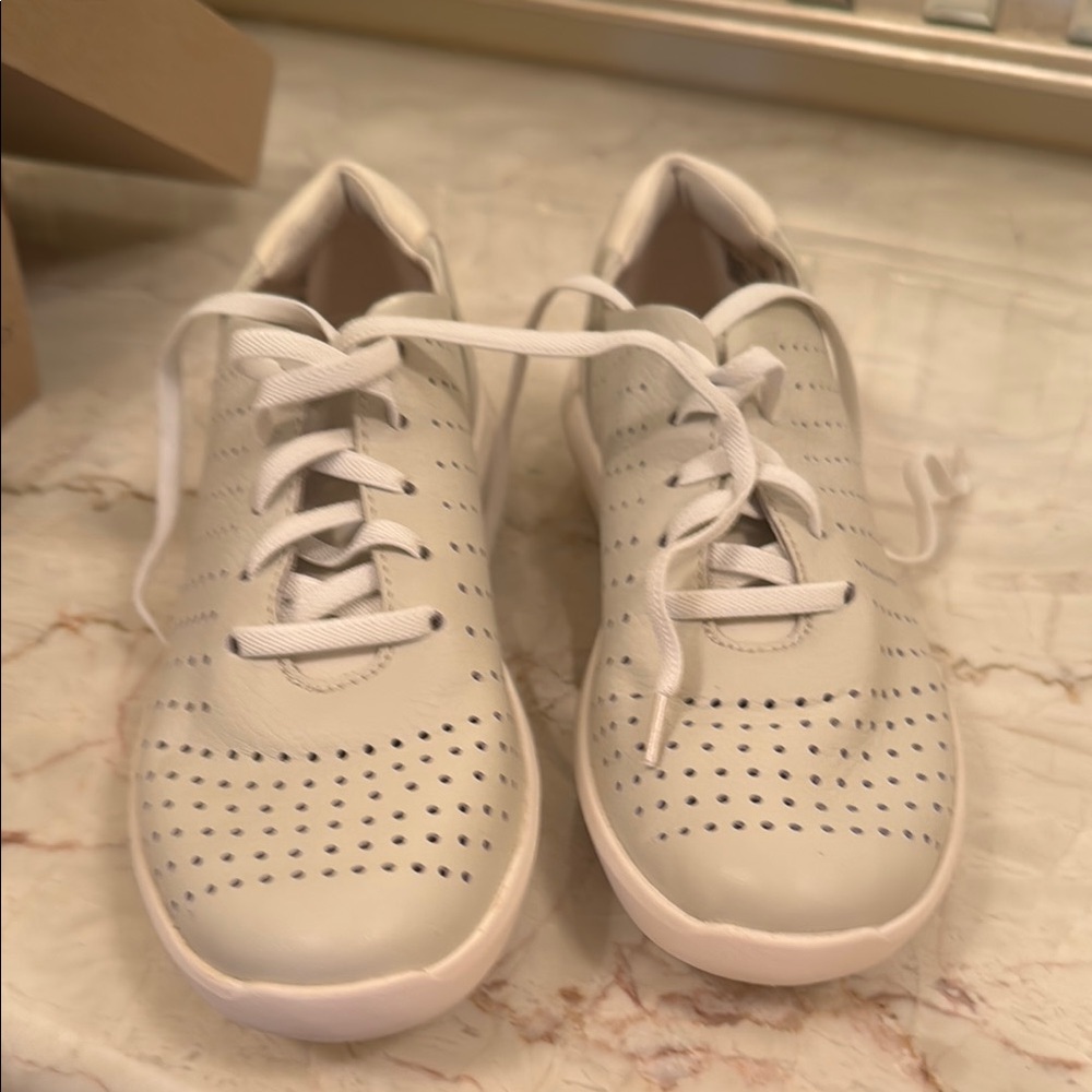 Women's Cream Sneakers brand new with box. Never worn